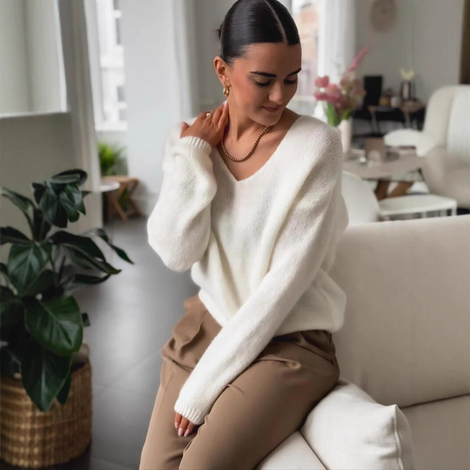 Fashionable And Comfortable Women's Sweater With A Dropped Shoulder Design